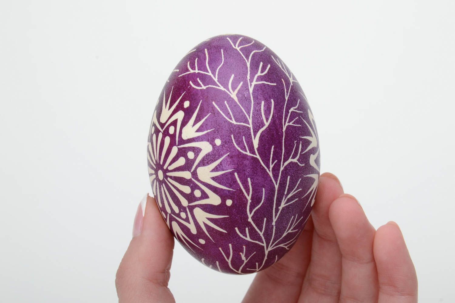 Handmade painted goose egg ornamented using waxing technique violet and white photo 5