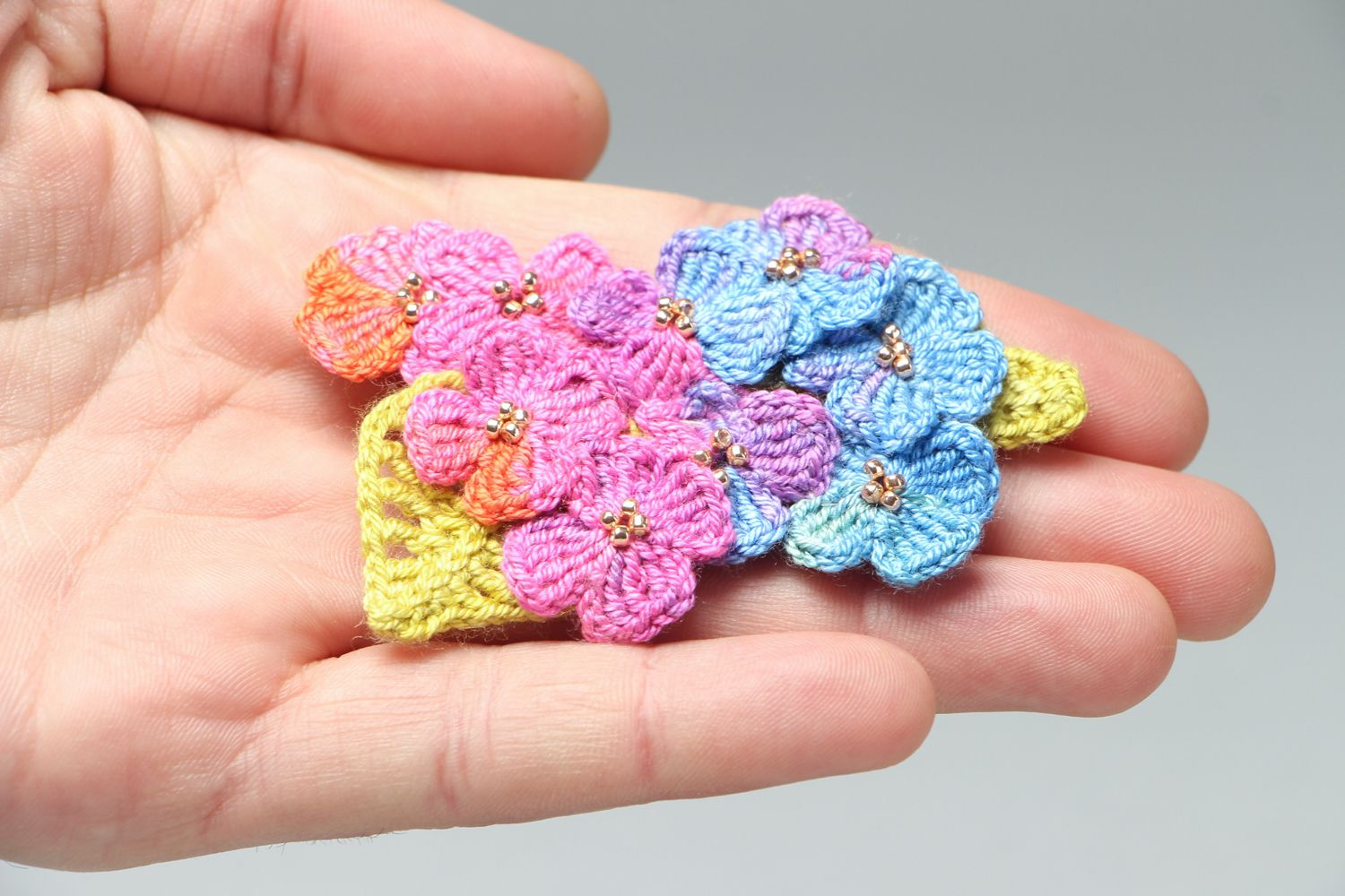 Multi-colored crochet flower brooch photo 4