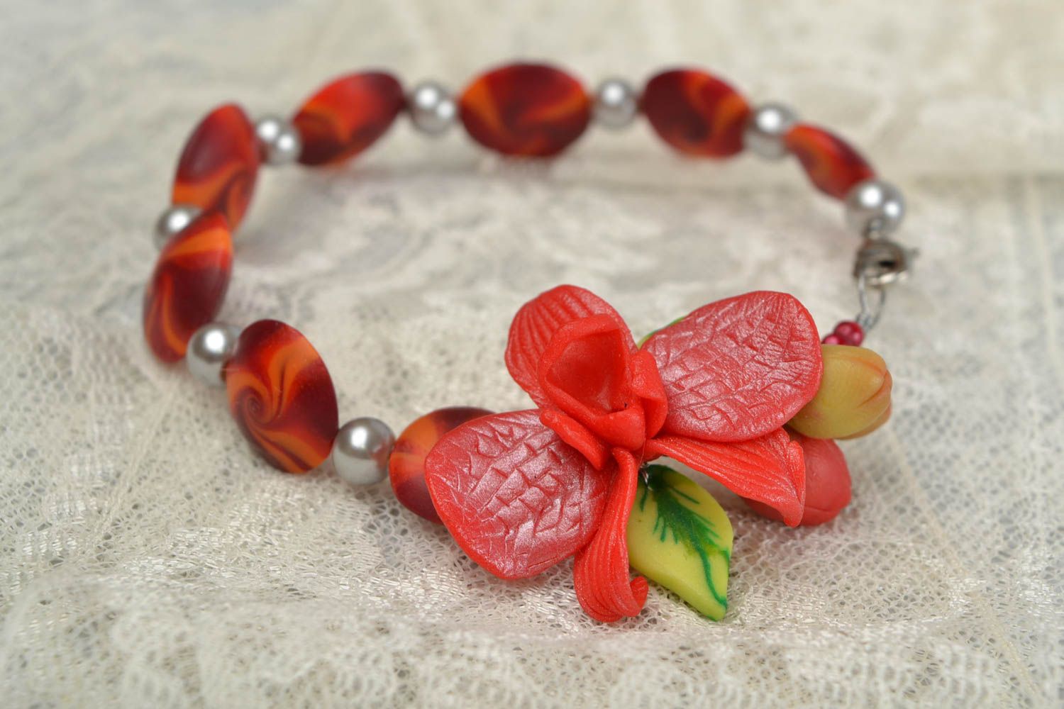 Handmade designer women's polymer clay bracelet with exotic flower photo 1
