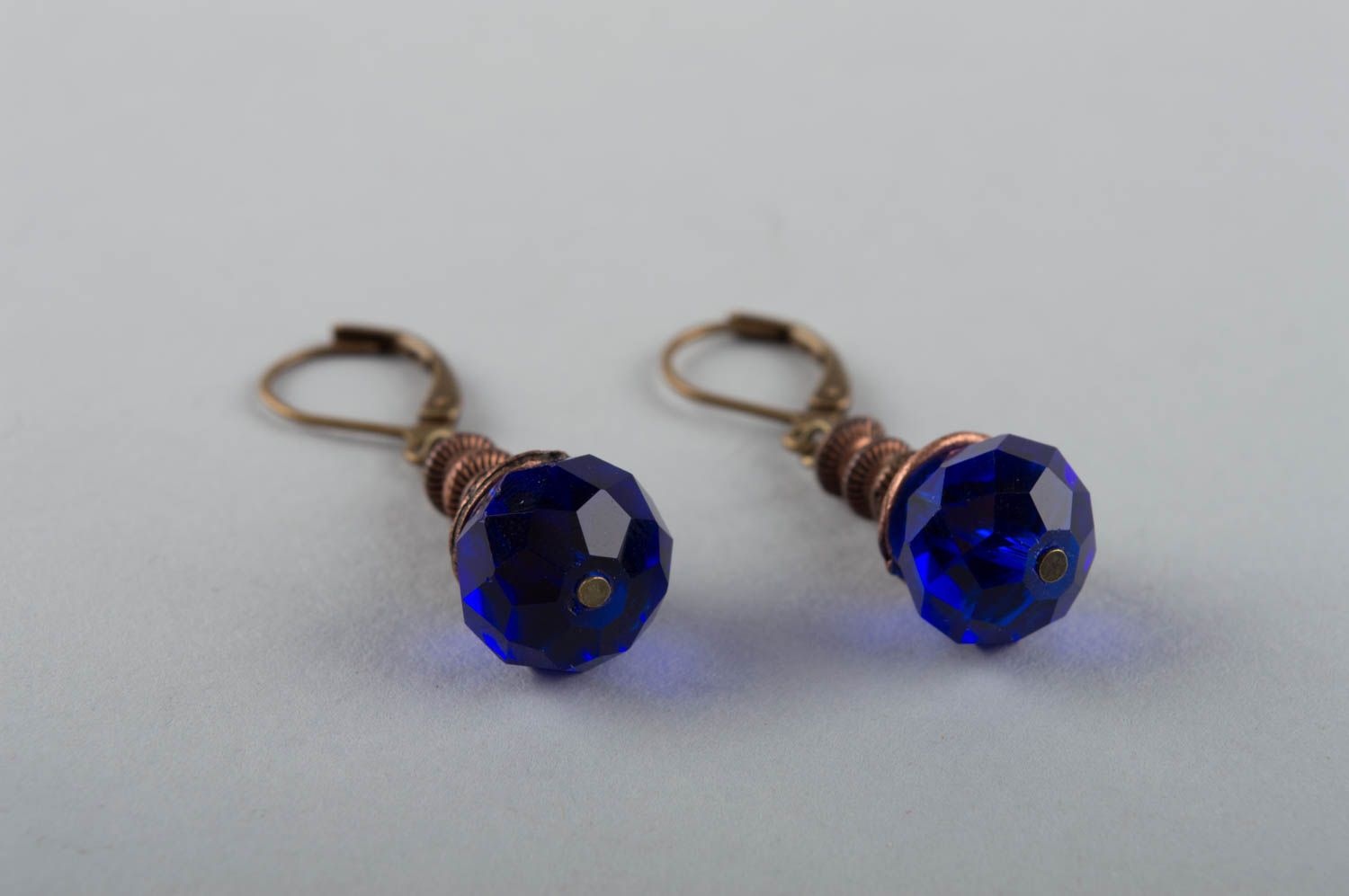 Unusual beautiful elegant handmade brass earrings with crystals of blue color photo 3