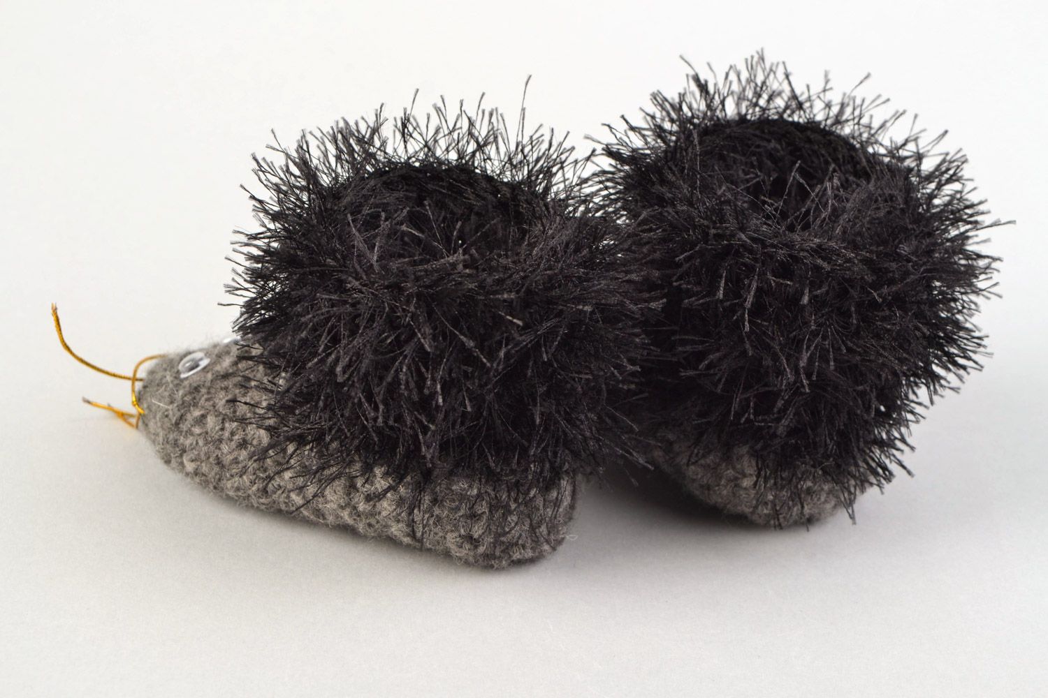 Handmade crochet baby shoes in the shape of gray hedgehogs with black edges photo 5