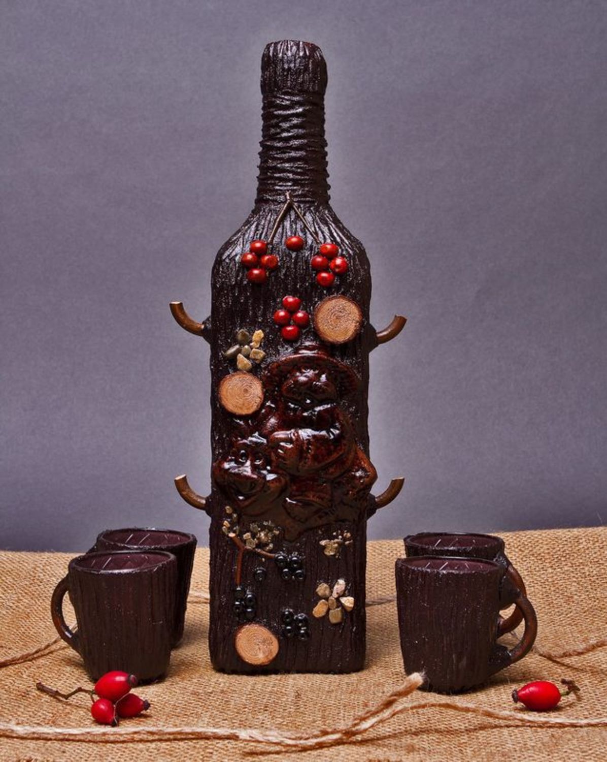 Decorative bottle with four cups photo 2