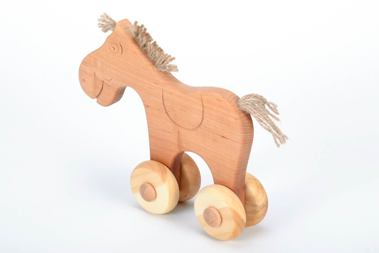 Kleines Pferd aus Holz foto 2