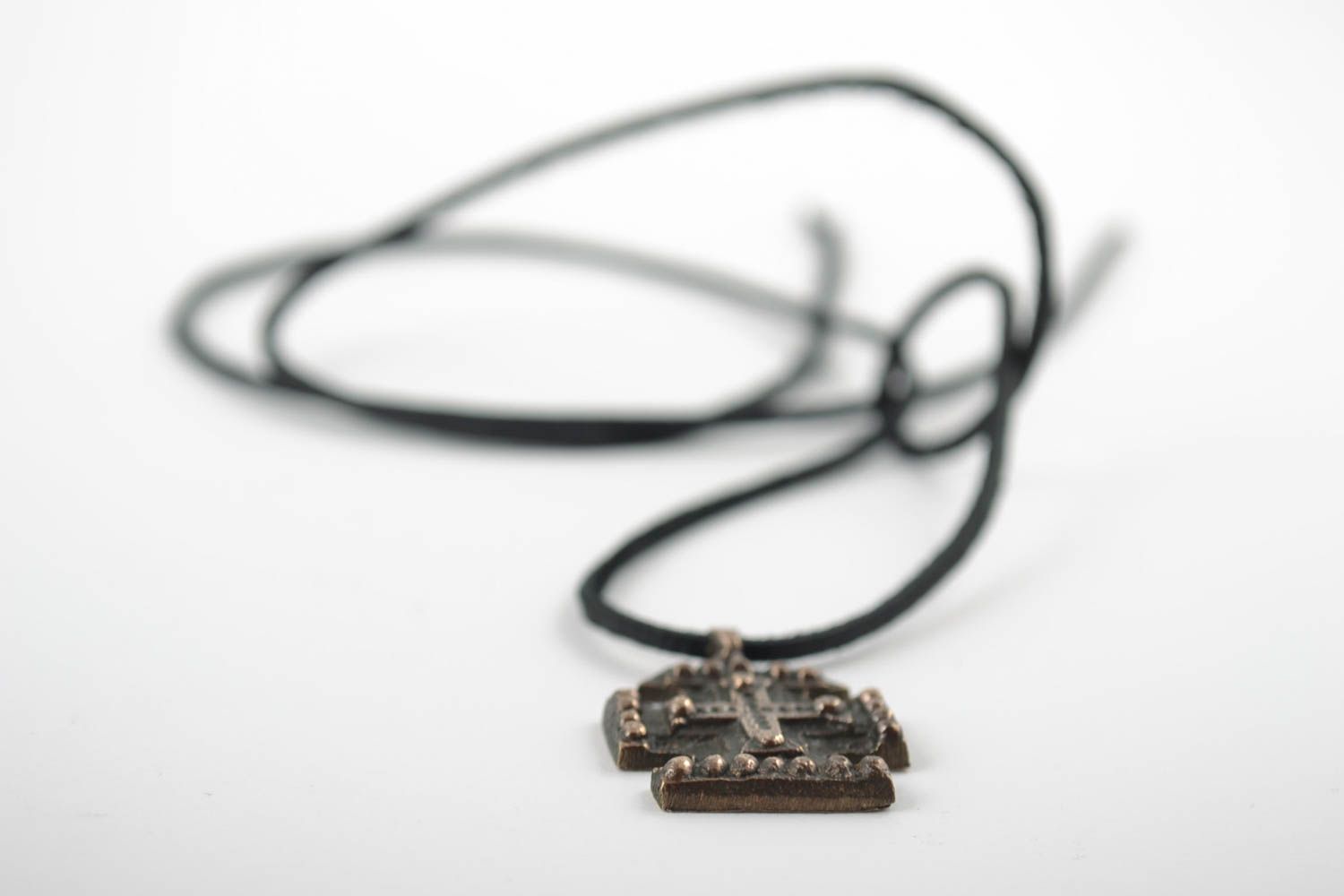 Small unusual next to skin handmade cross pendant cast of bronze on black cord photo 5