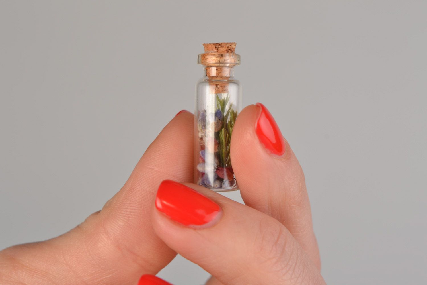 Unusual beautiful handmade small flask pendant with dried flowers inside photo 2