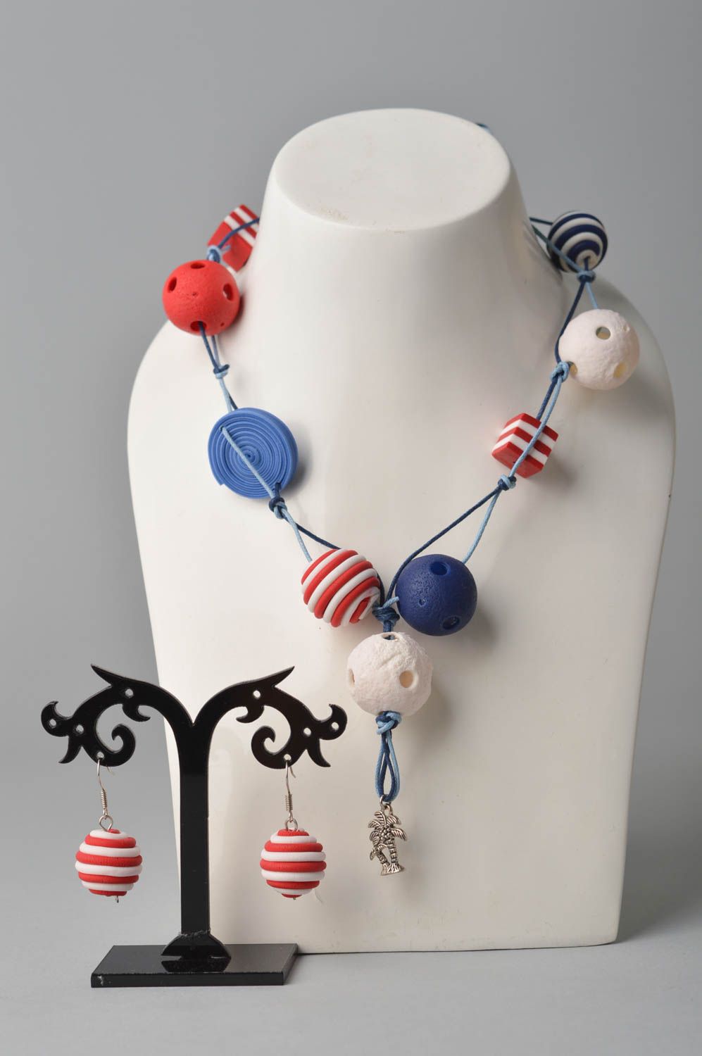 Ceramic bright beads' necklace on three cords with white, red, blue large beads photo 1