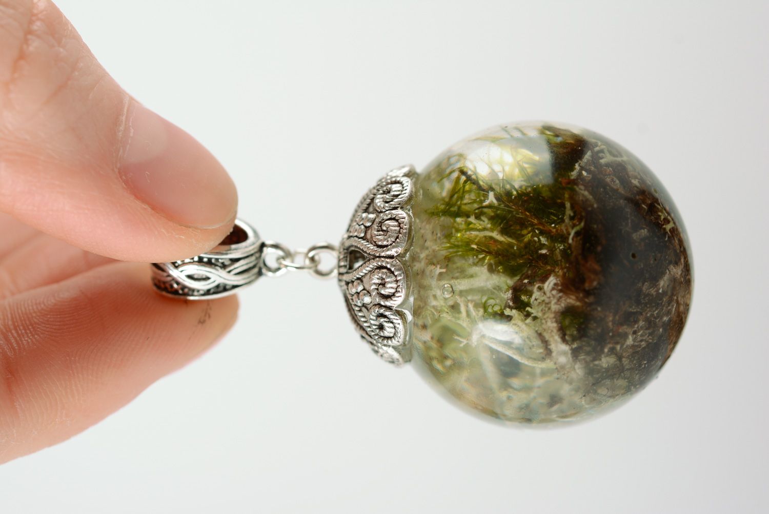 Handmade transparent round neck pendant with moss inside coated with epoxy resin photo 2