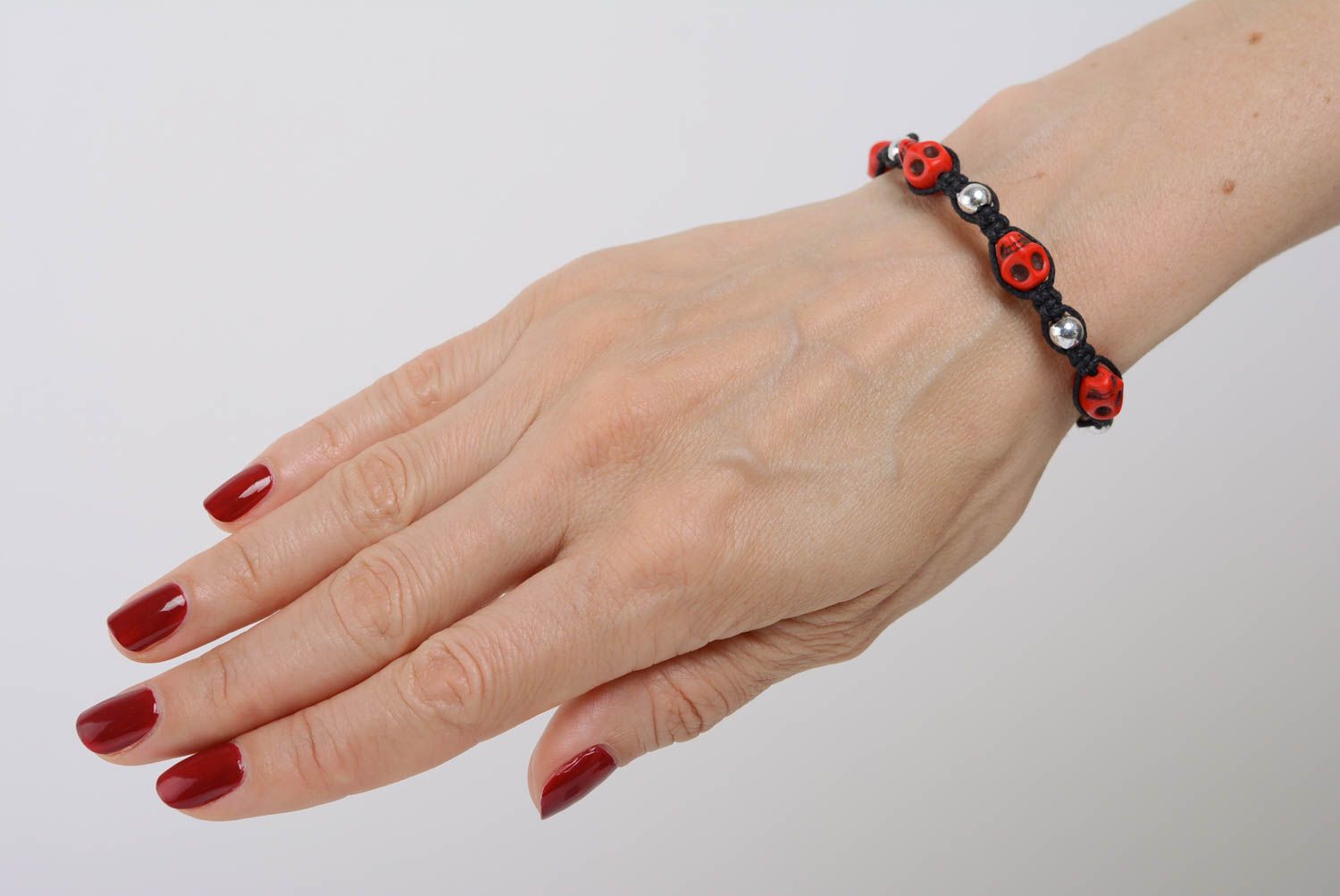 Handmade unusual women's woven cord bracelet with beads and skulls designer photo 2