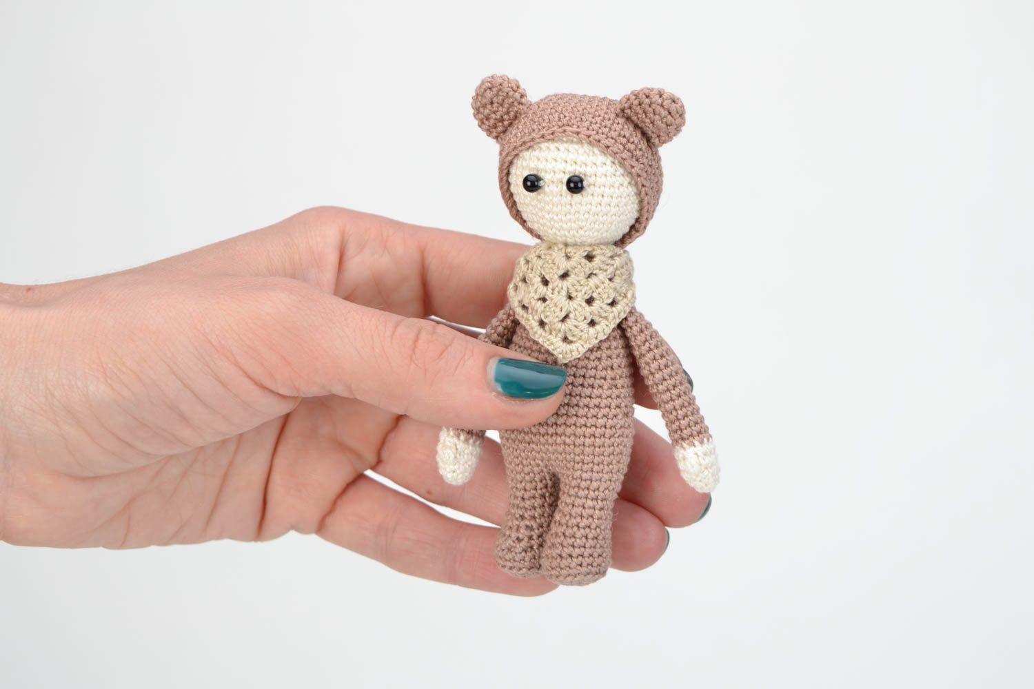 Small brown handmade crochet doll in the costume of bear photo 2