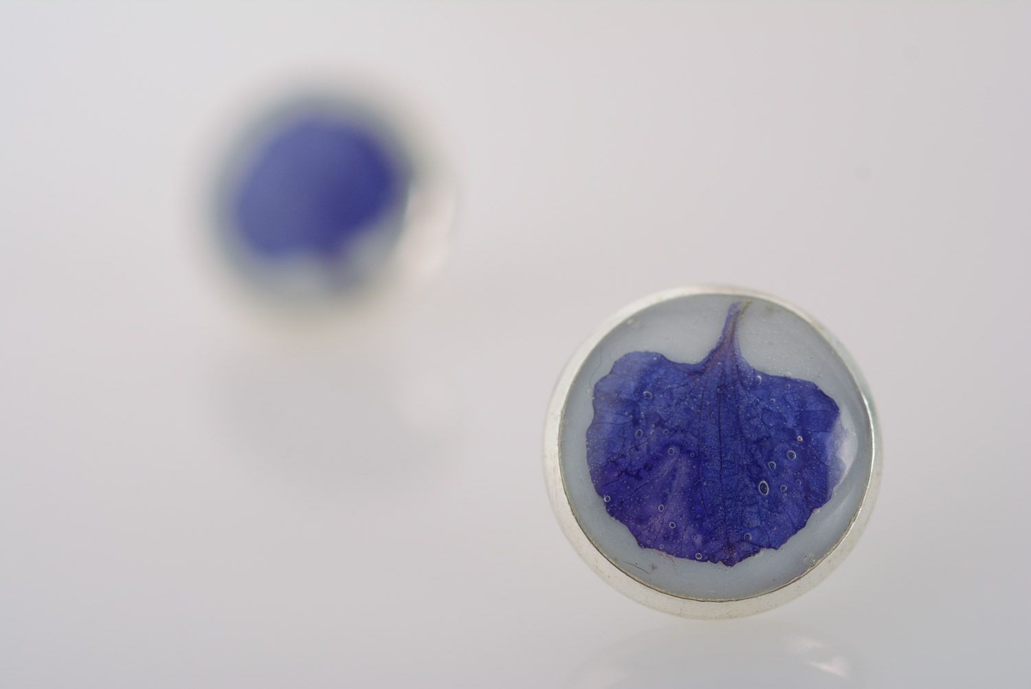 Tender small round stud earrings with blue petals in epoxy resin homemade  photo 2