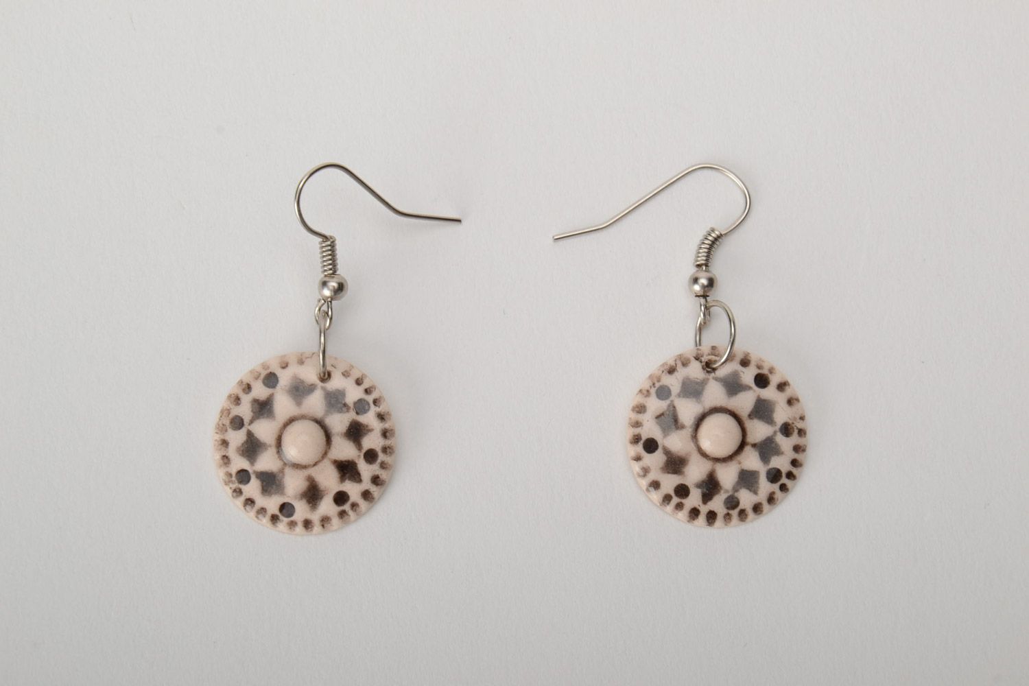 Light round earrings with ornament hand made of white clay for women photo 3