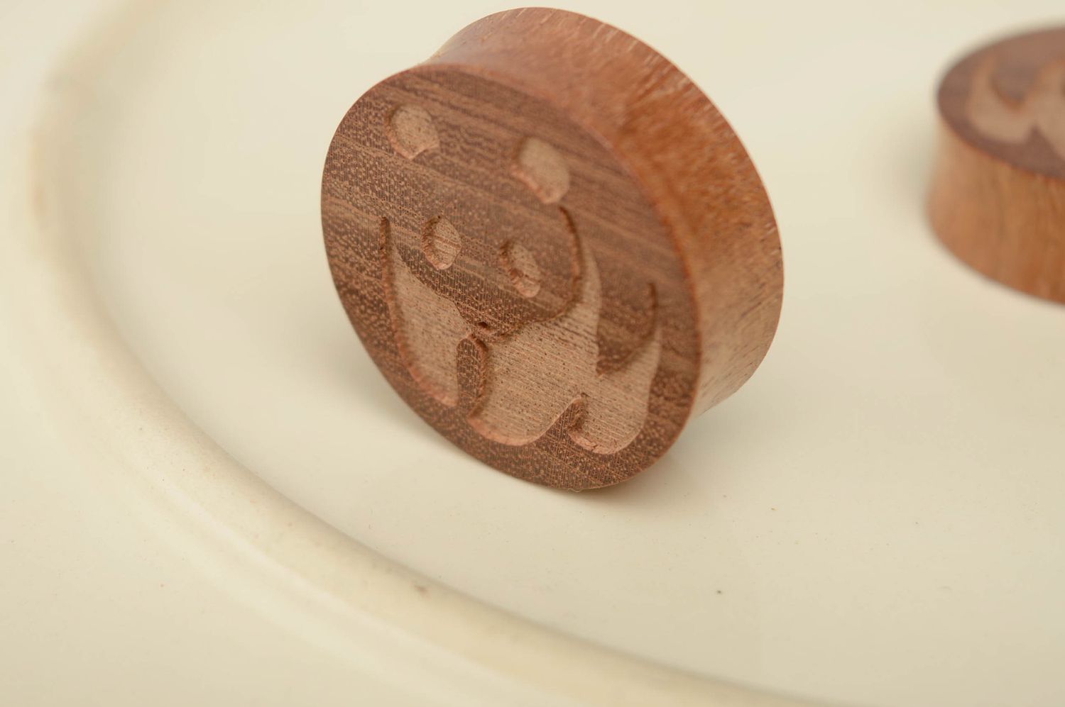 Wooden ear plugs with engraving in the shape of bears photo 2