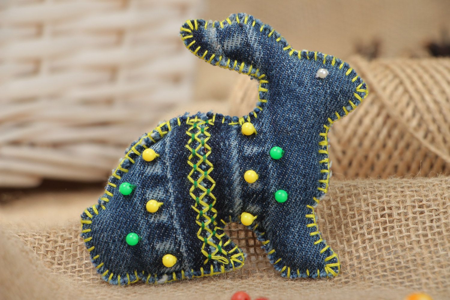 Small homemade soft toy sewn of denim fabric embroidered with beads Rabbit photo 1