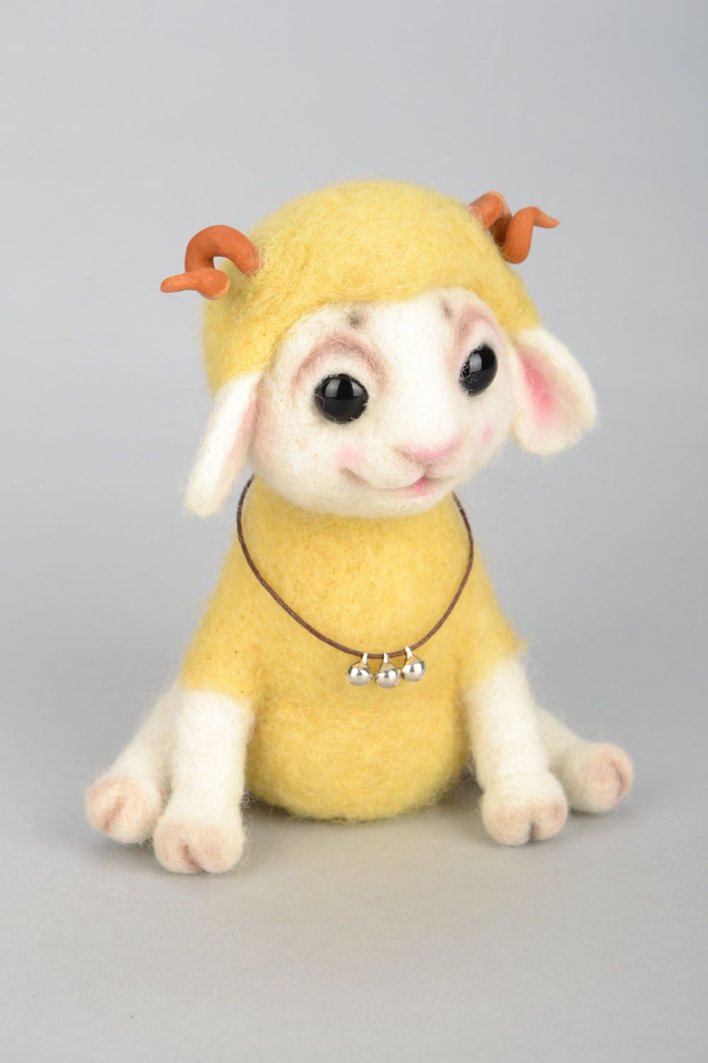 Yellow lamb design soft toy photo 1