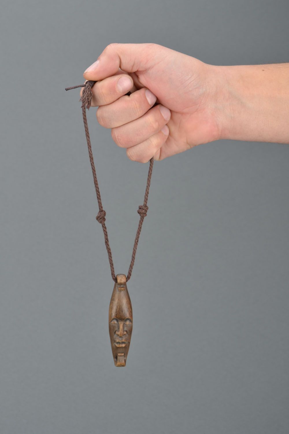 Wooden pendant mask on cord photo 2