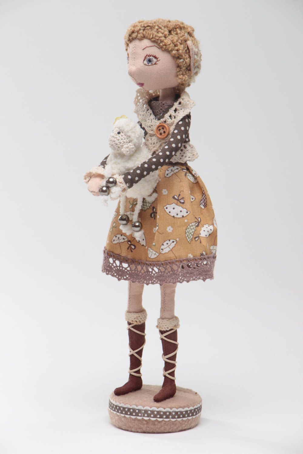 Handmade designer fabric soft doll in brown dress with toy lamb on stand photo 2