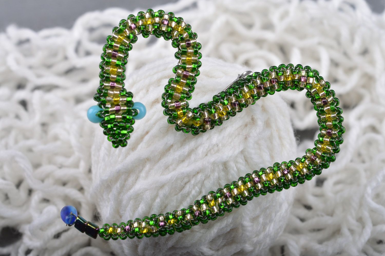 Unusual handmade green brooch snake woven of beads and fishing line photo 1