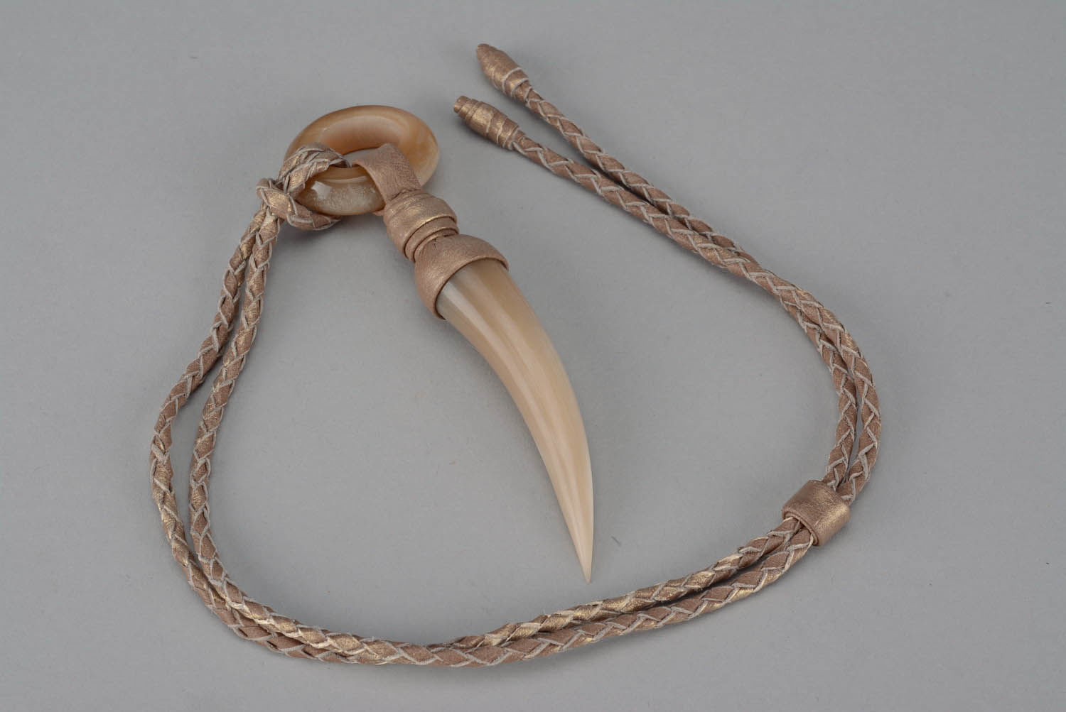 Pendant made of polished cow horn photo 2