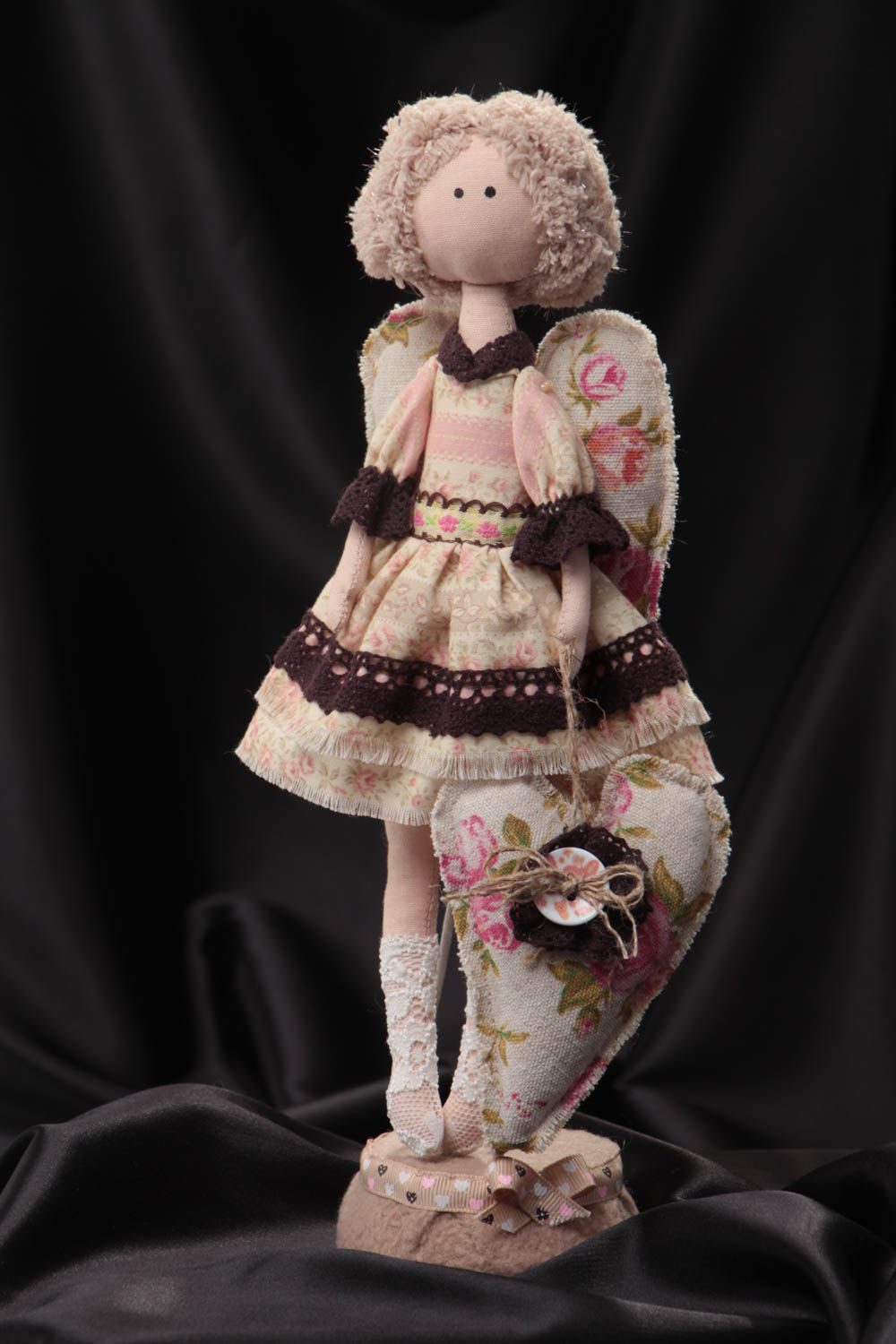Handmade designer tender fabric soft doll in beige with floral heart and wings photo 1
