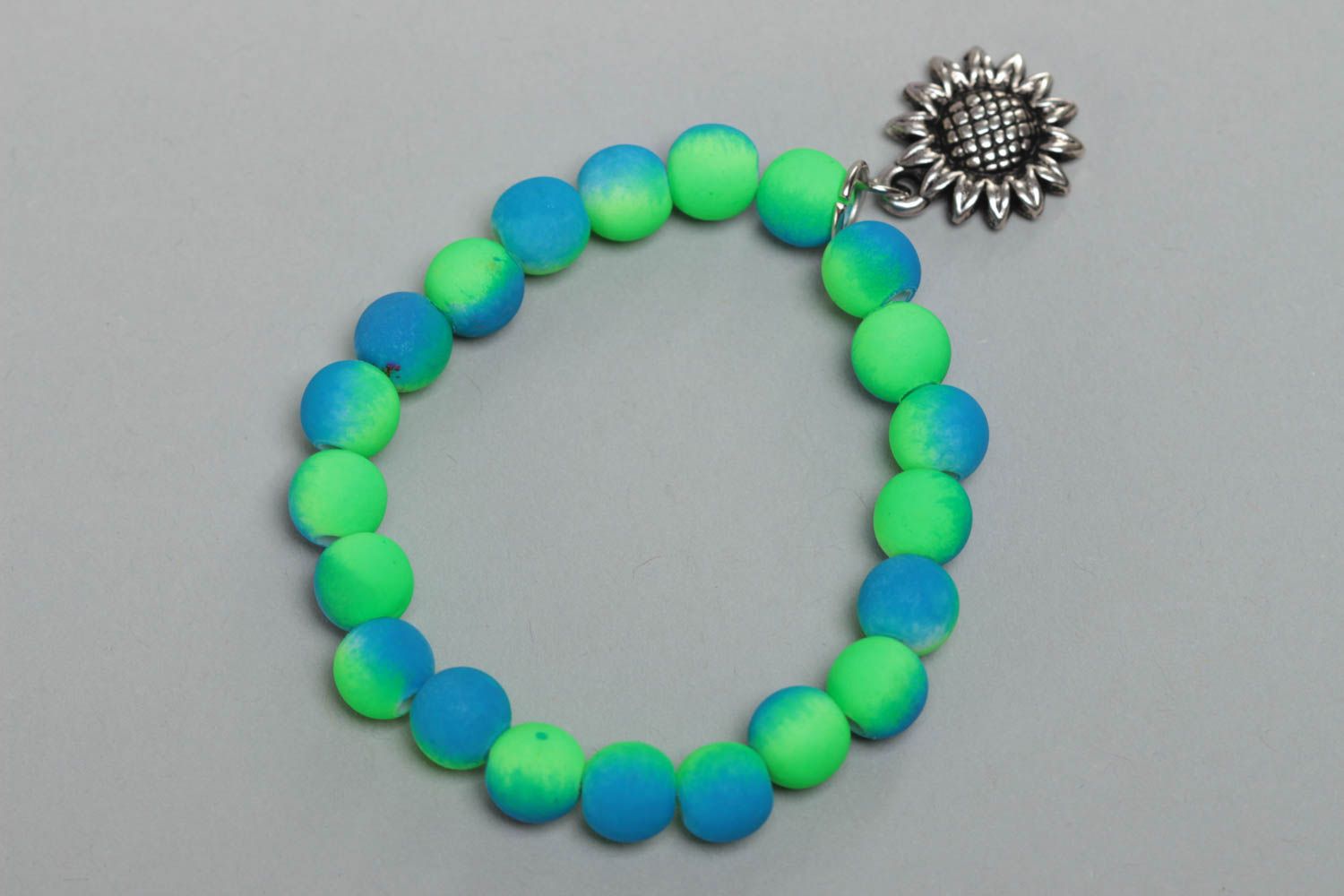 Unusual eye-catching handmade plastic bead bracelet with flower charm stretchy photo 4
