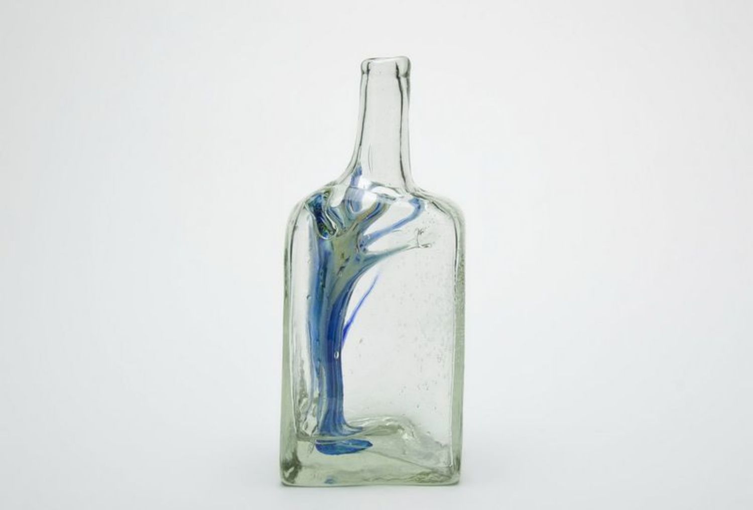 Botella decorativa con dibujo azul foto 1