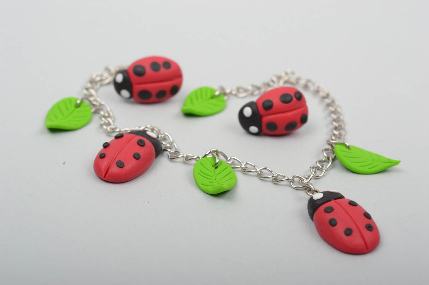 Ladybug stud earrings and chain charm bracelet for a girl photo 2