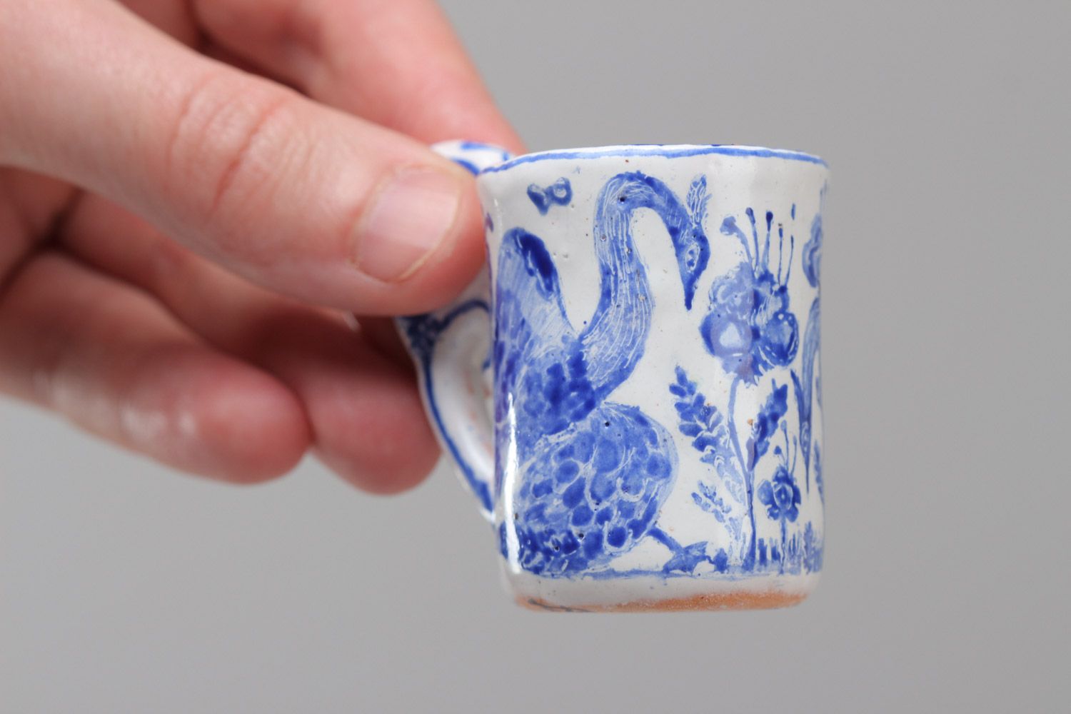 Handmade decorative painted ceramic cup figurine of white and blue colors photo 5
