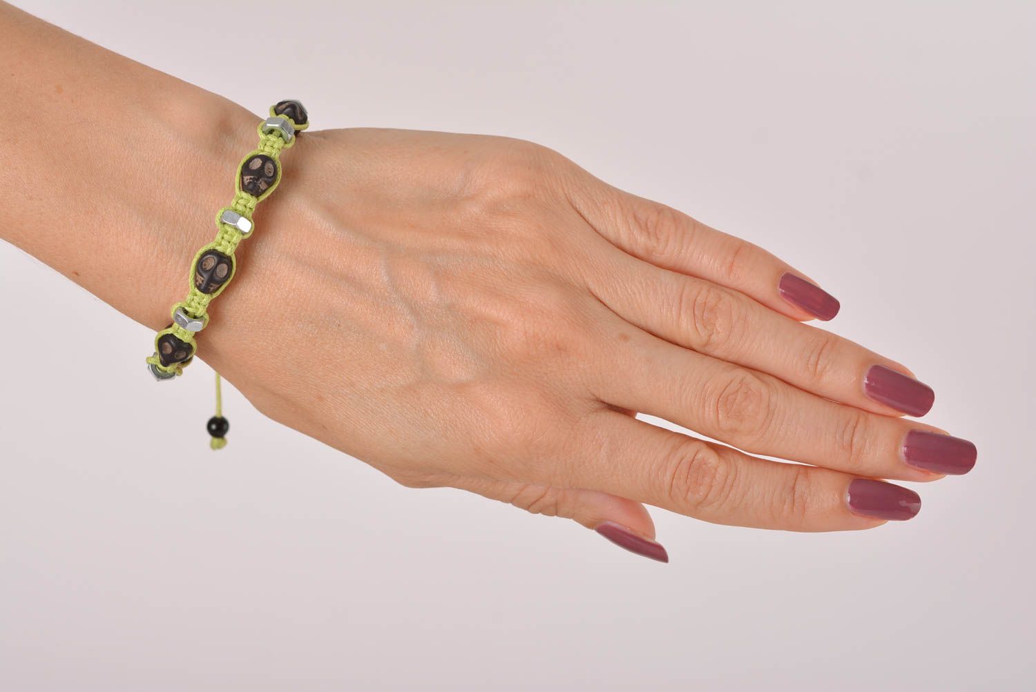 Handmade black skull color beads on light green cord bracelet with female screws photo 3
