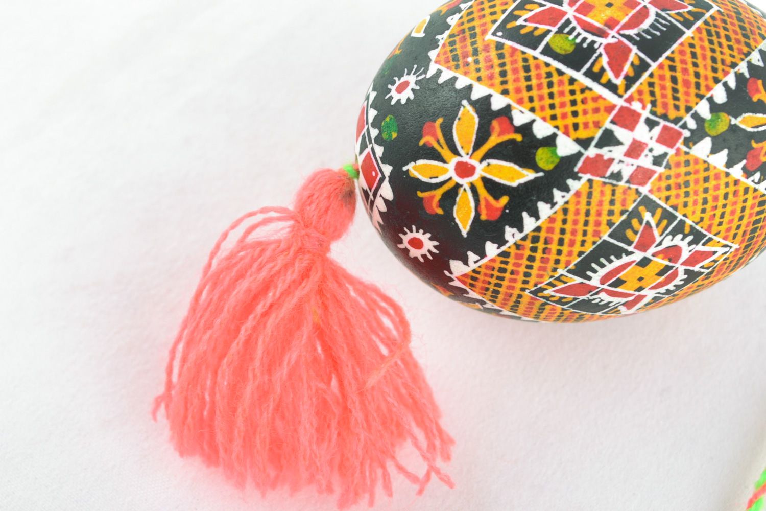 Handmade hanging Easter egg painted with hot wax and decorated with tassel  photo 4