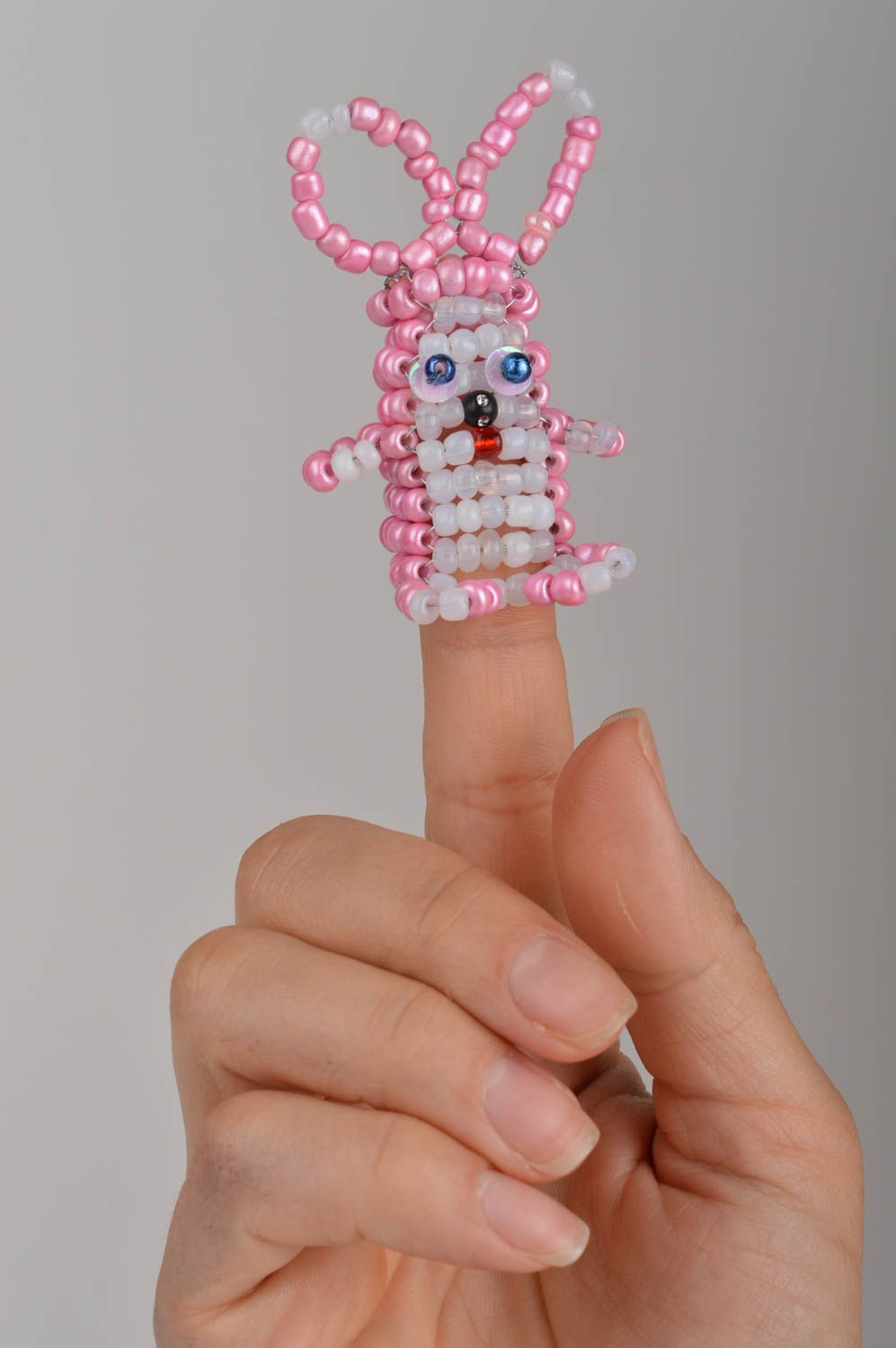 Handmade decorative finger toy rabbit made of Chinese beads for children  photo 4