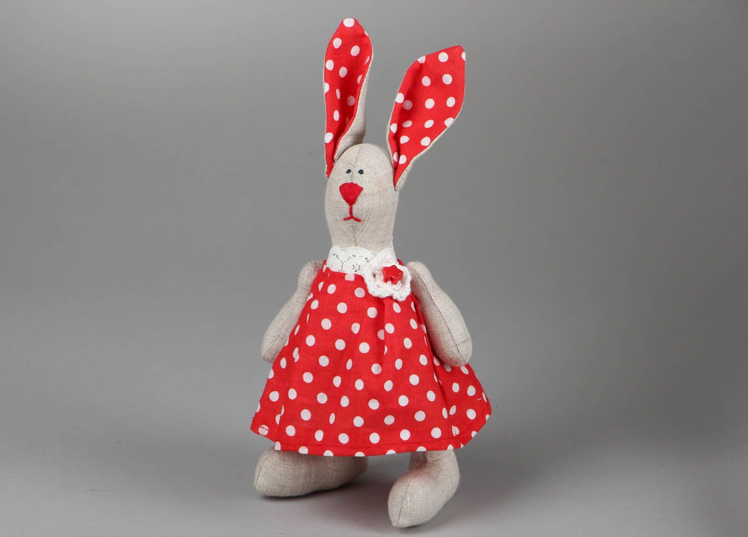 A rabbit in a dress in spots photo 1