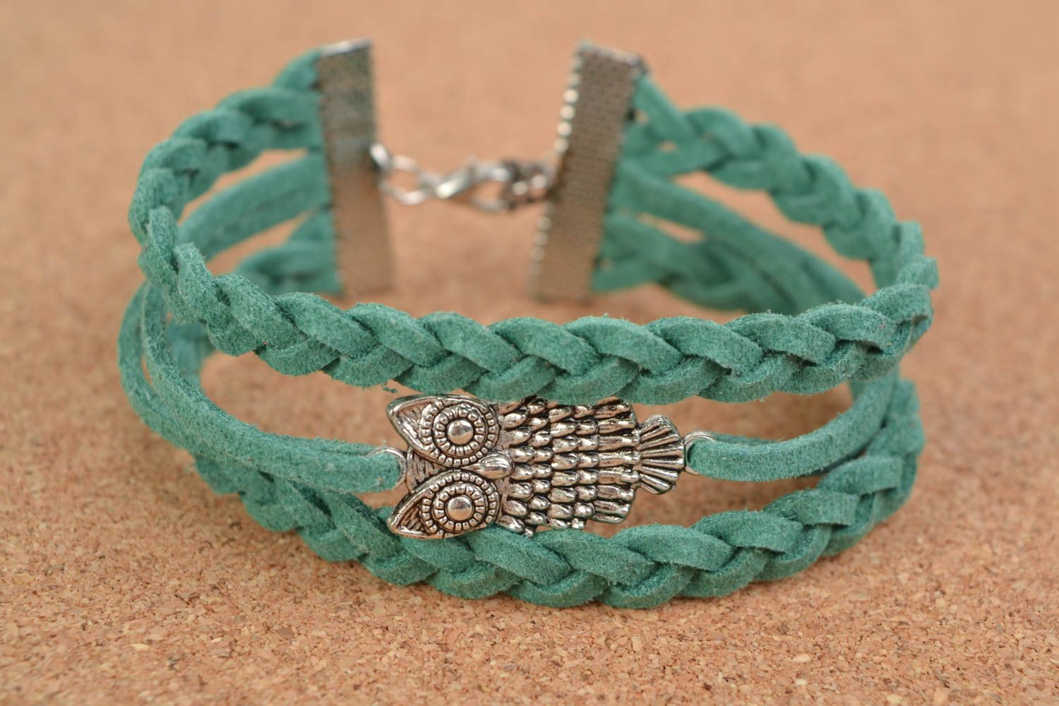 Green handmade woven suede cord bracelet with charm in the shape of owl photo 1