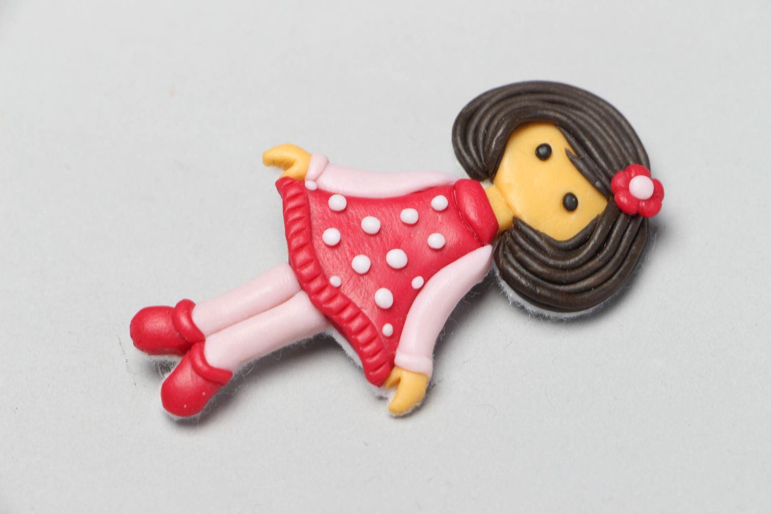 Plastic brooch in the shape of doll Polina photo 1