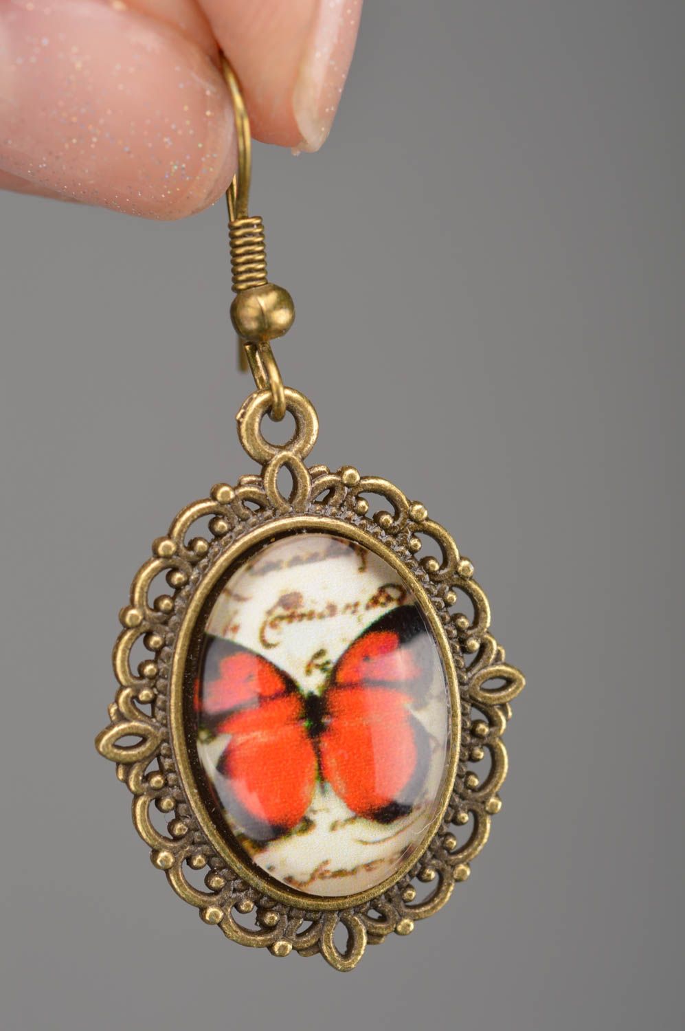 Beautiful handmade designer vintage metal earrings with butterflies print photo 2