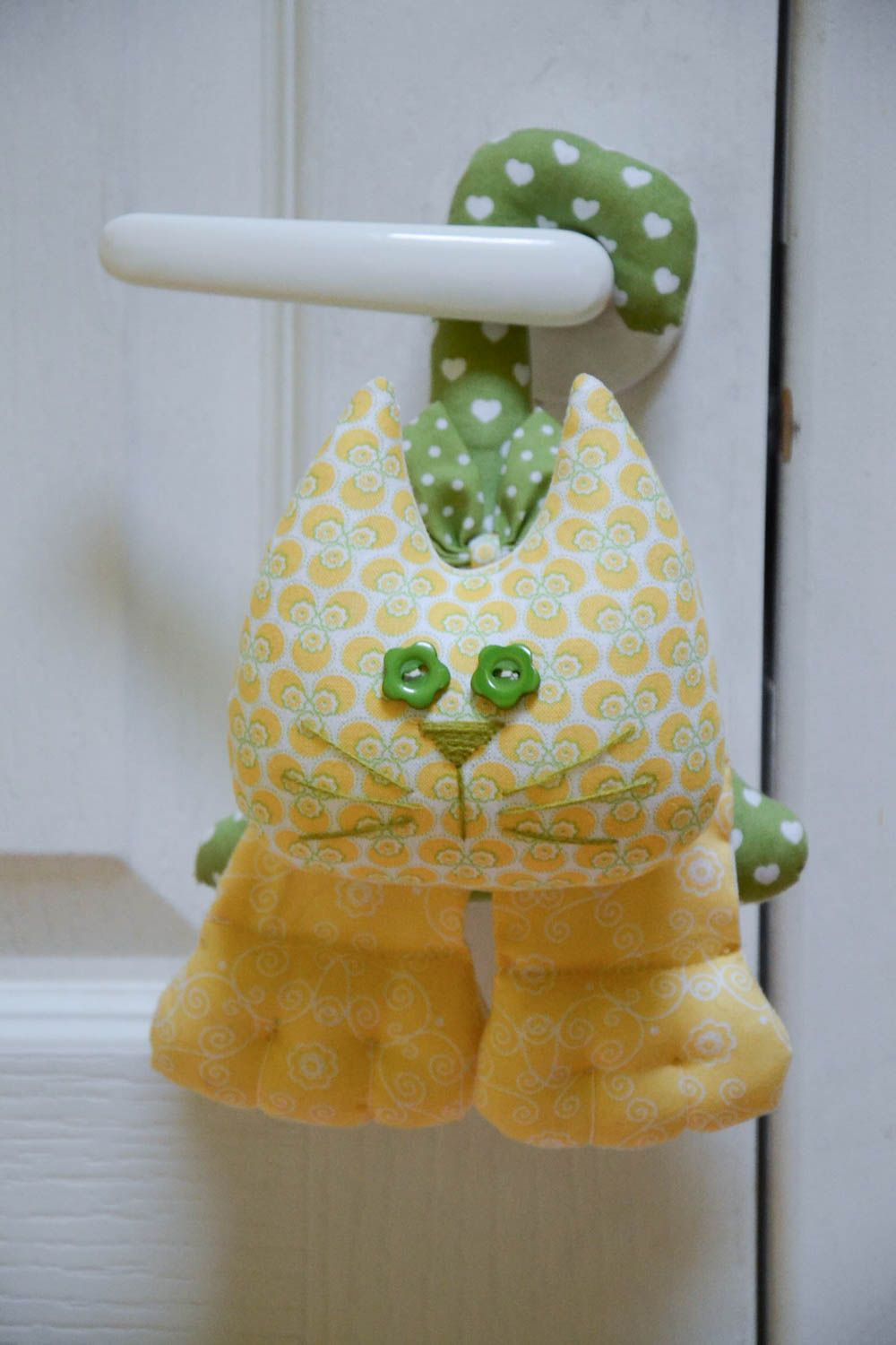 Handmade designer yellow and green cotton fabric soft toy cat door handle decor photo 1