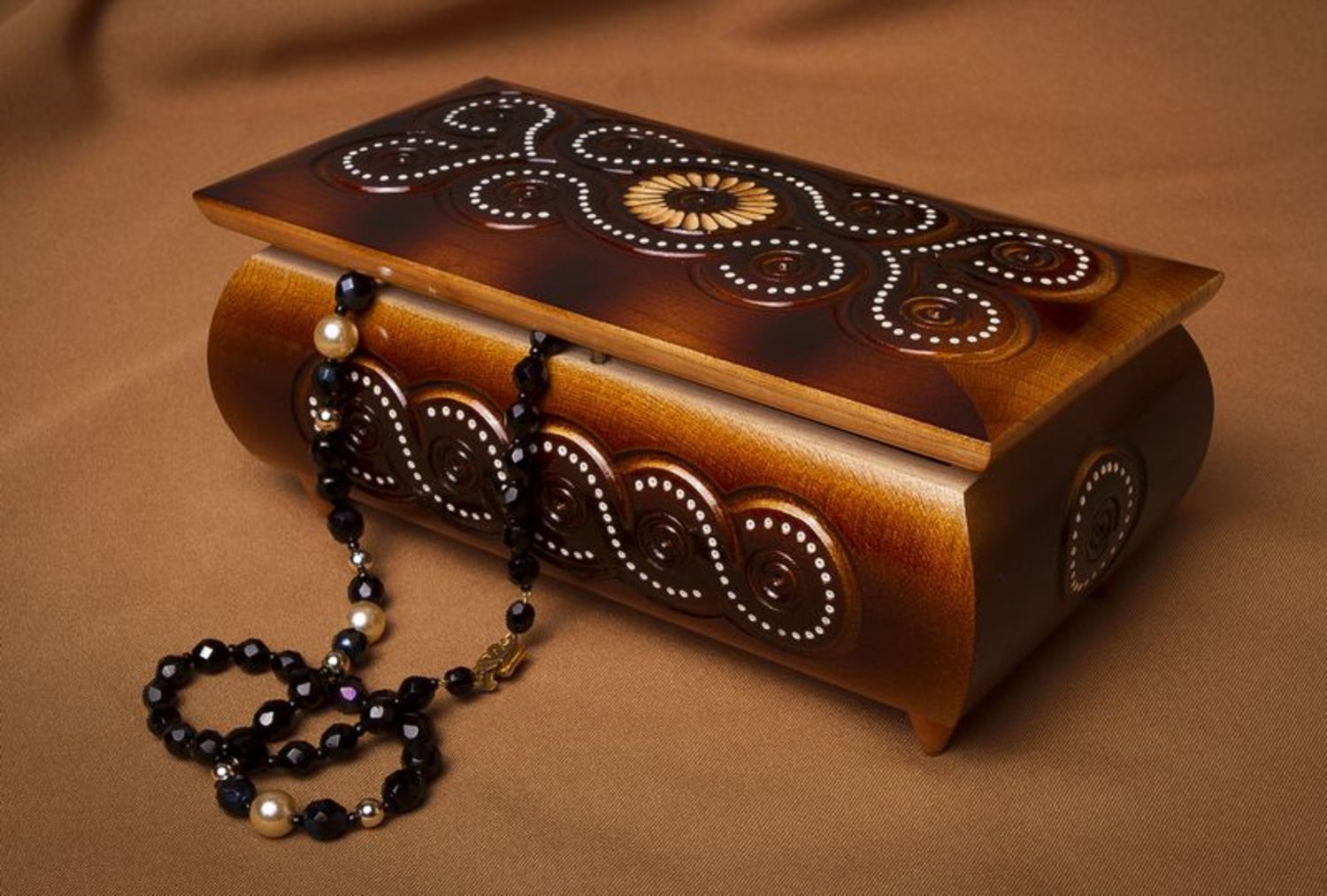 Carved wooden box with encrustation photo 1