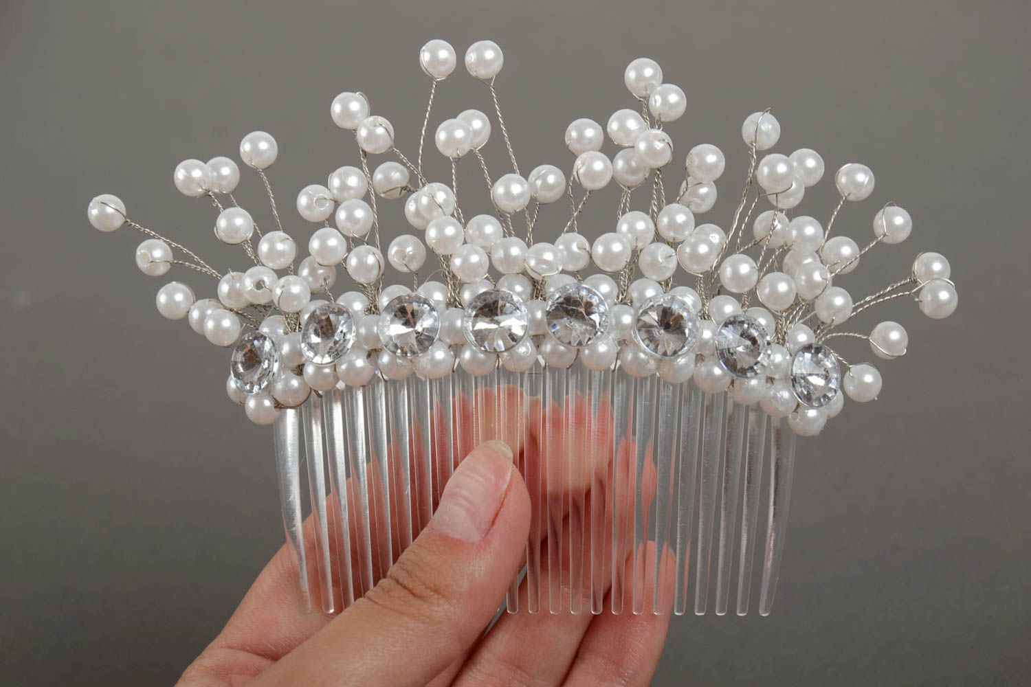 Beautiful handmade white plastic hair comb with beads and flowers photo 3