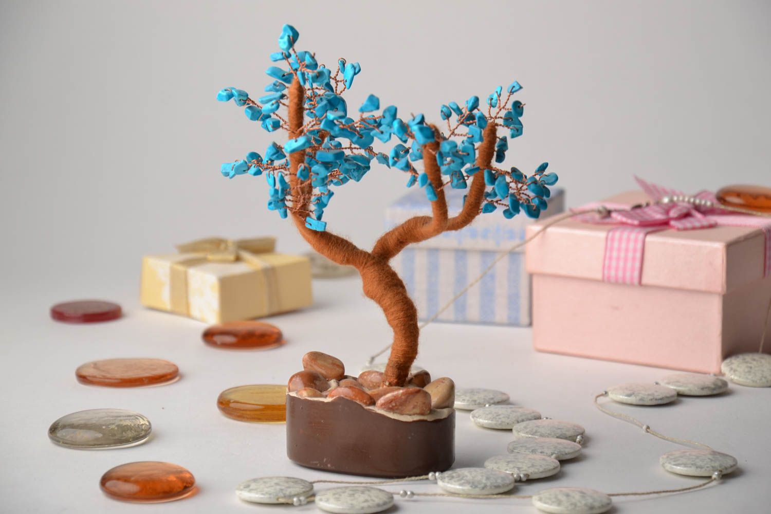 Decorative bonsai tree with natural stones photo 1