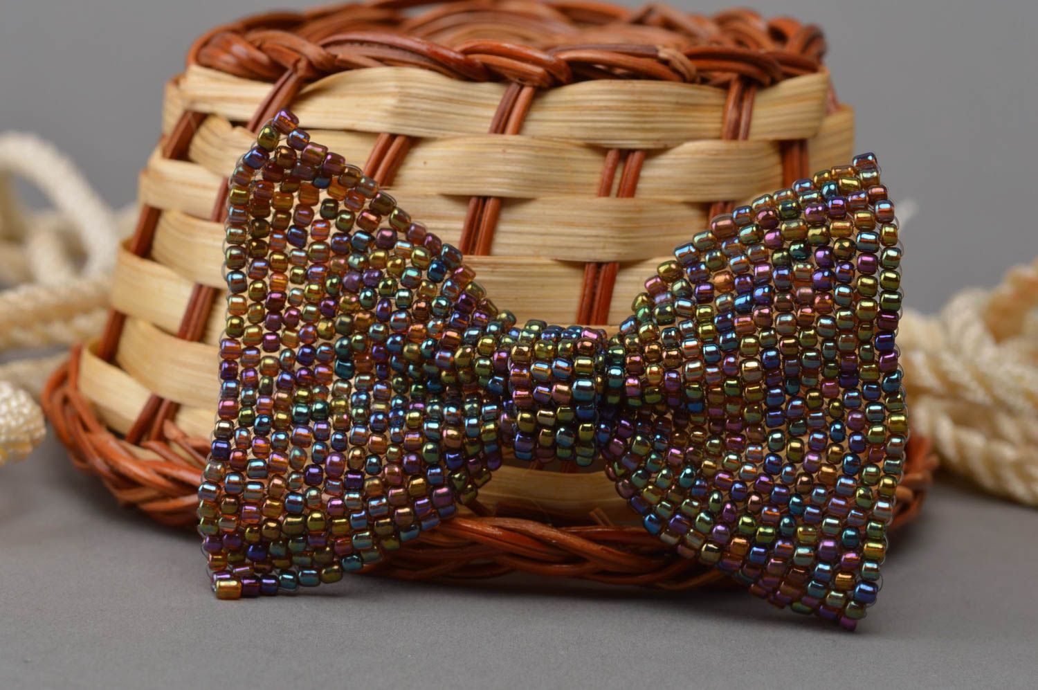 Fancy stylish handmade multicolor beaded brooch in the form of a bow photo 1