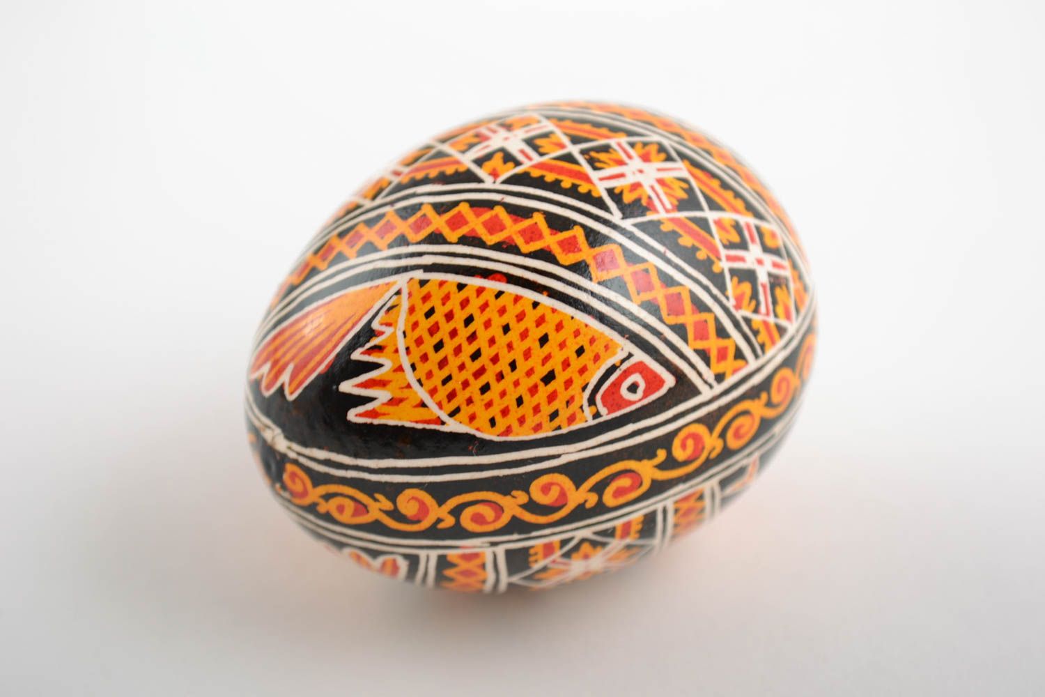 Easter egg painted with acrylic dyes handmade chicken egg with fish pattern photo 4