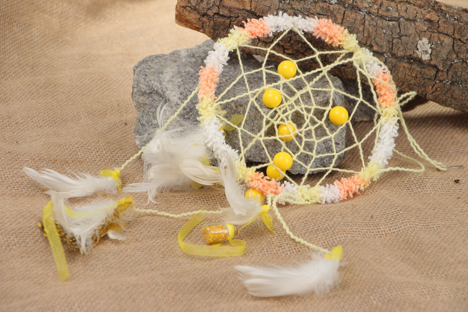 White and yellow homemade dreamcatcher wall hanging with feathers Sun Ray photo 1