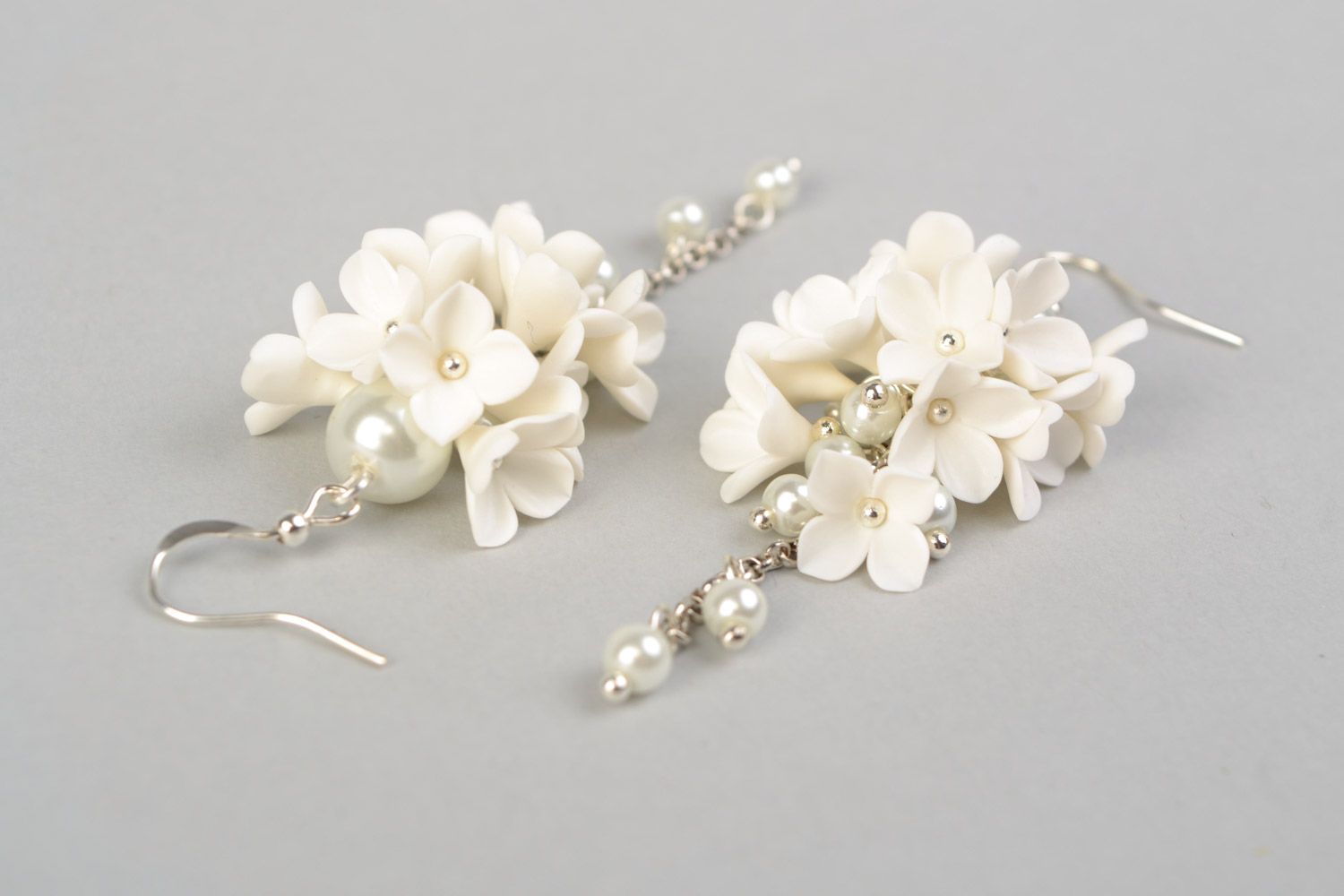 Handmade wedding dangling earrings with white polymer clay flowers and glass beads photo 4