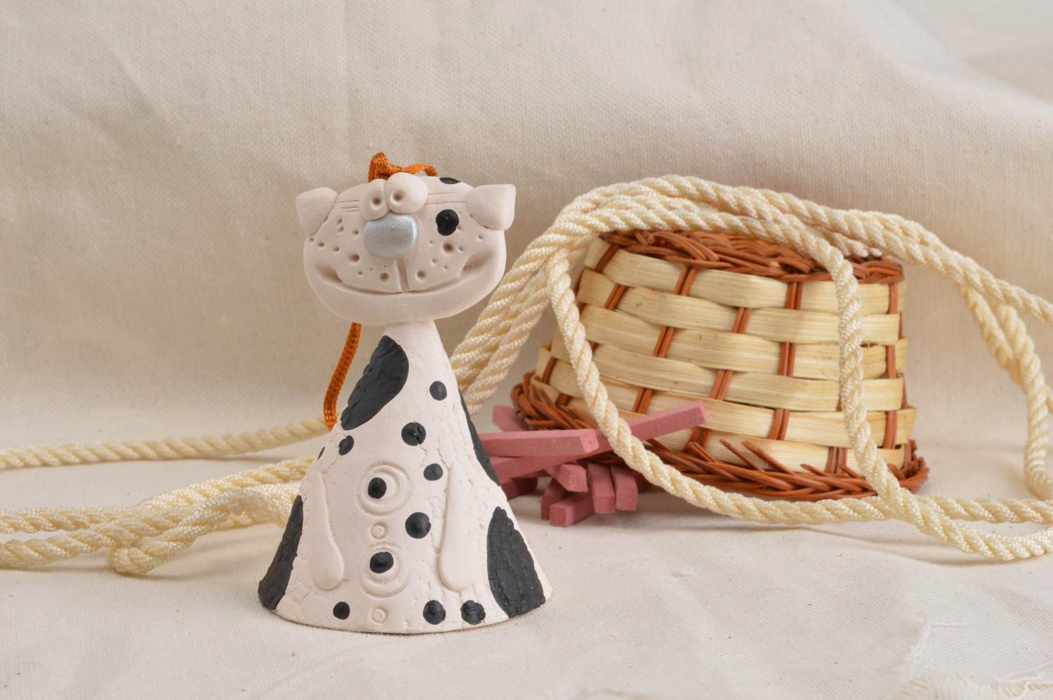 Handmade stylish unusual decorated with paints clay bell in shape of cat photo 1