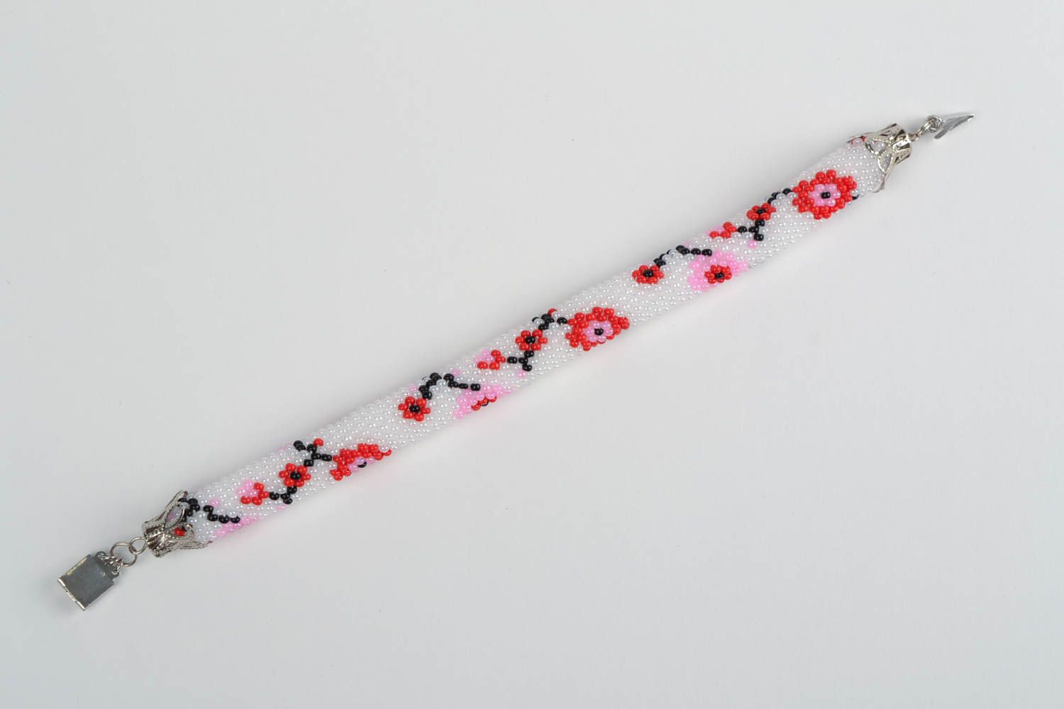 Beaded corded handmade female white bracelet with flowers photo 3
