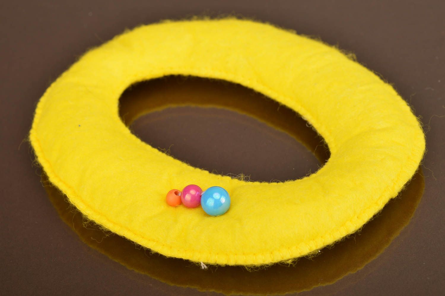 Handmade small soft toy letter O sewn of felt yellow for interior decoration  photo 2