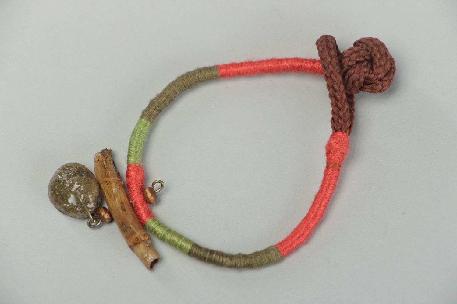 Handmade bright friendship bracelet woven of threads with seaweed in epoxy resin photo 1