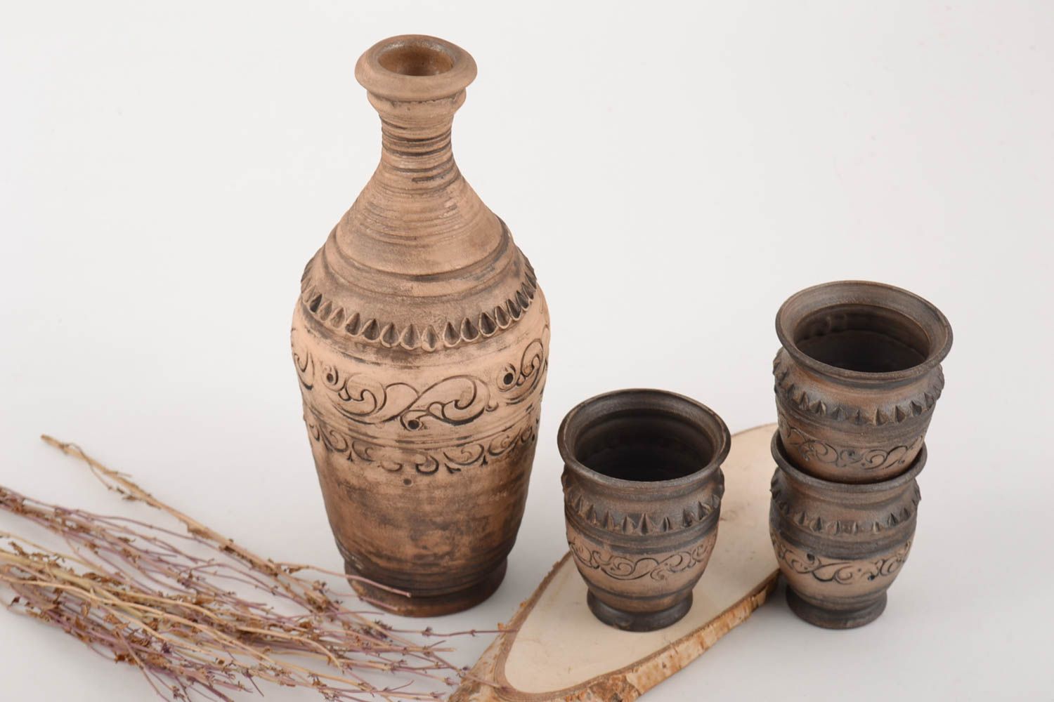 Botella de cerámica 500 ml y tres vasos hechos a mano hermosos ionizados foto 1