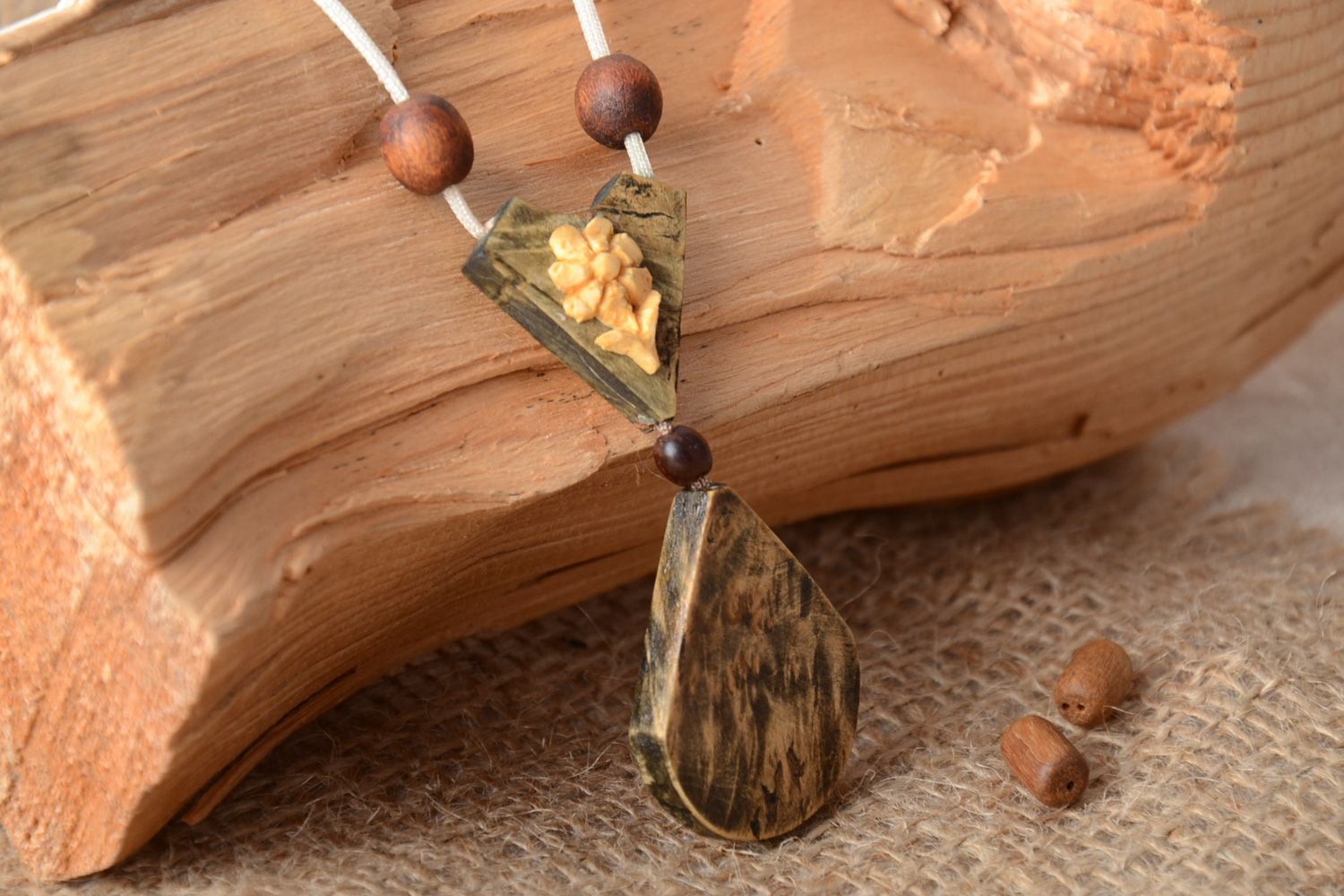 Handmade neck pendant carved of wood with unusual design on cord for women photo 1