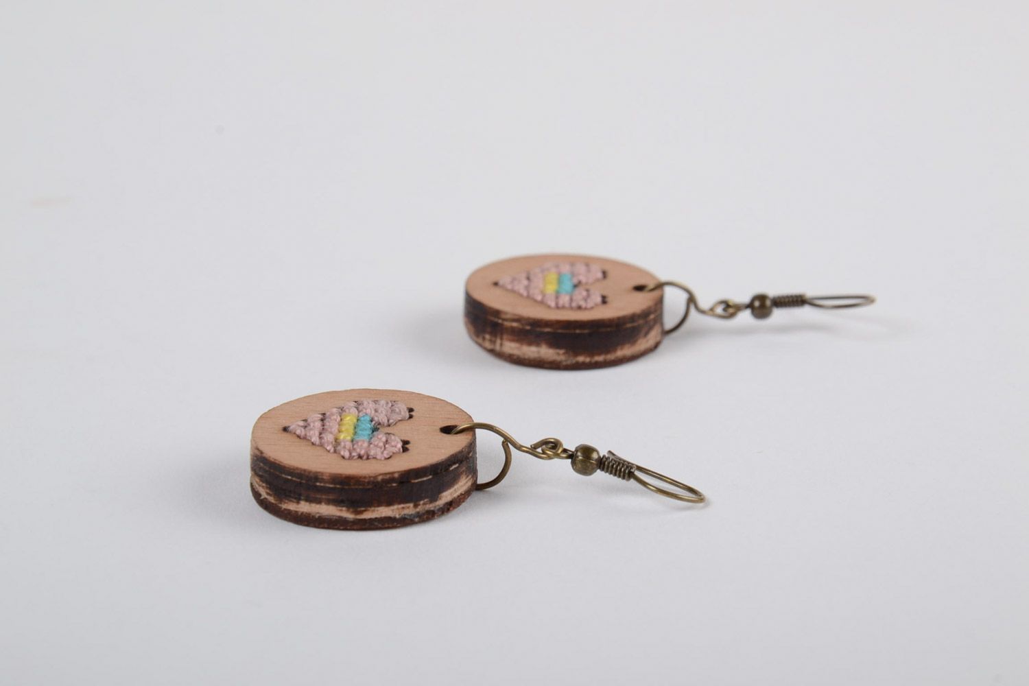 Handmade round plywood earrings with cross-stitch embroidery Pink Hearts photo 2