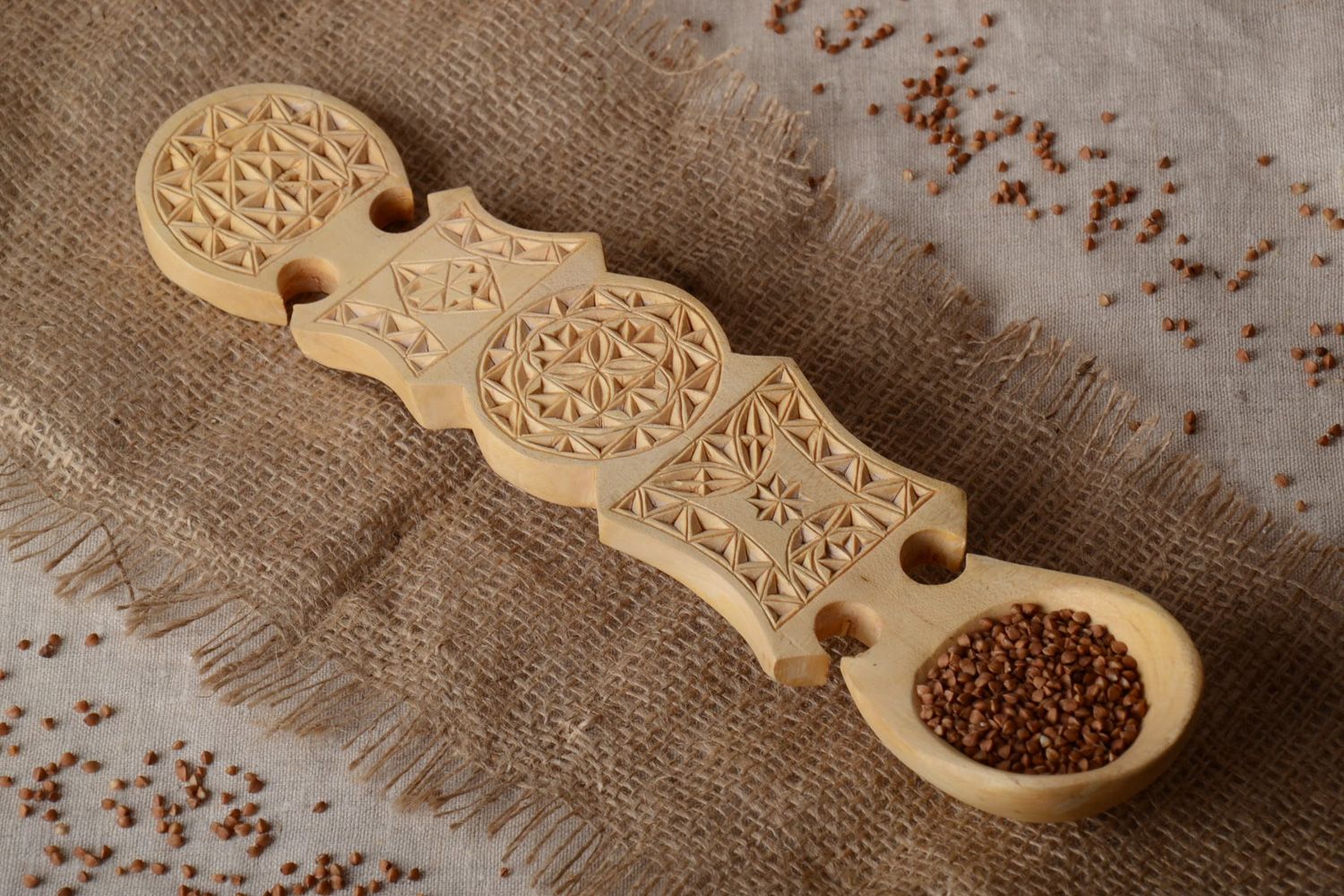 Large handmade carved wooden spoon with ornament in ethnic style for wall decor photo 1